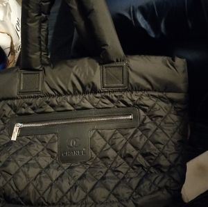 Black chanel tote bag.